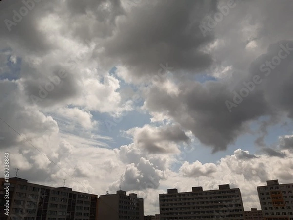 Fototapeta clouds over city
