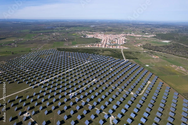 Fototapeta Aerial view of solar panels stretching across Alentejo,Portugal. Sustainable resource concept capturing renewable energy. Photovoltaic power generation, greem energie.