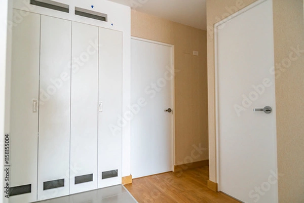 Fototapeta habitacion de departamento flat con closet de melamina color blanco y paredes tapizadas