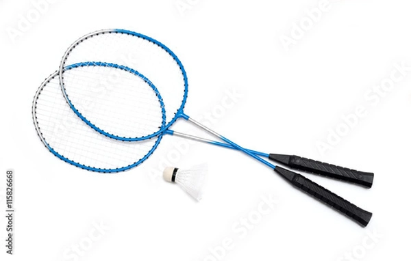 Fototapeta child's hand holding a badminton racket on a white