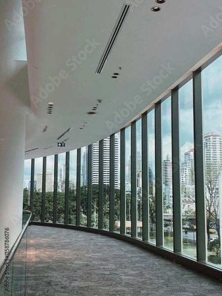 Obraz Urban View Through Curved Glass Windows