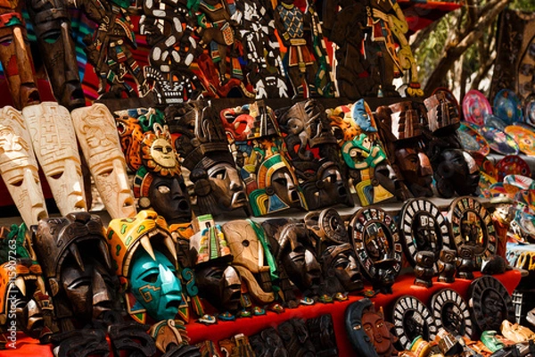 Fototapeta Different wooden souvenirs at the local Mexican market