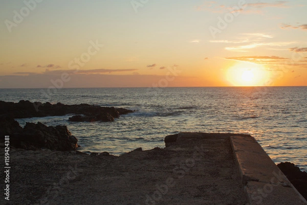 Fototapeta view of the sunset near seashore at moroni Island in Comores