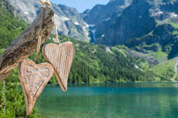 Fototapeta Two wooden heart on the background of the Mountain Lake Morskie Oko in the High Tatras 