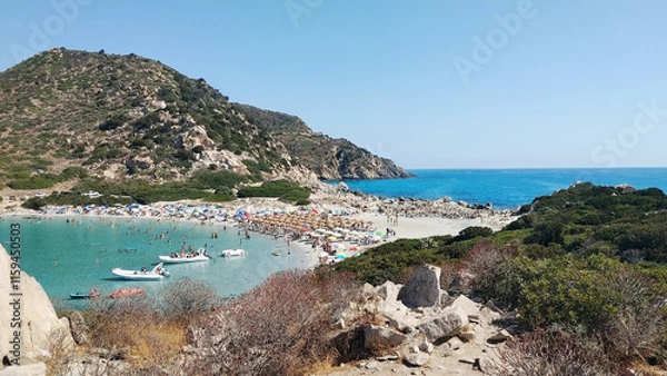 Obraz Beach in Villasimius, Cagliari, on the southeast tip of Sardinia Island, Italy. The idyllic isthmus of Punta Molentis with white sand and stones of the old granite quarry.