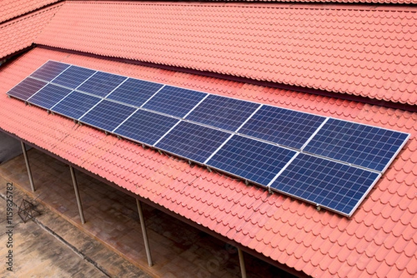Obraz Solar panels are installed on the roof of the house to produce eletricity