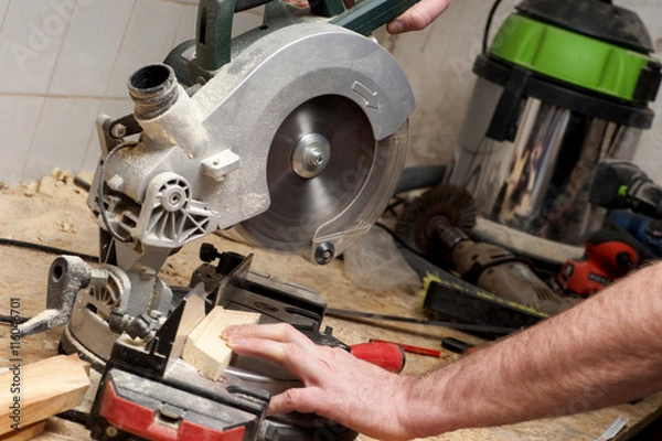 Fototapeta Carpenter working. Carpenter tools on wooden table with sawdust. Carpenter workplace top view