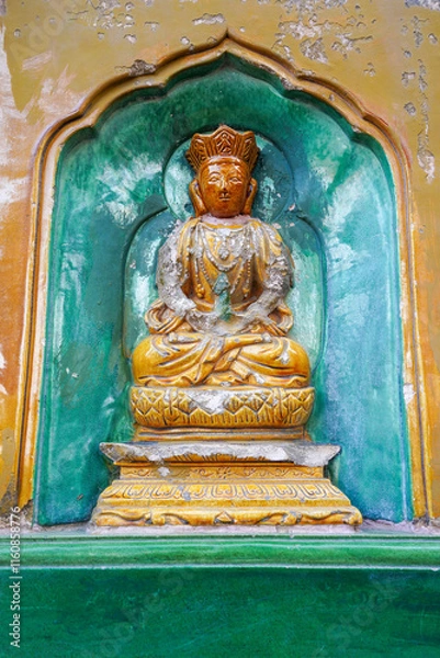 Obraz glazed Buddha on the wall of the Wisdom-Sea Temple, The Liangless Buddha Temple at the top of Wanshou Mountain in Summer Palace in Beijing.