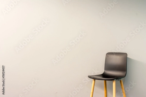 Fototapeta Single modern chair by the wall