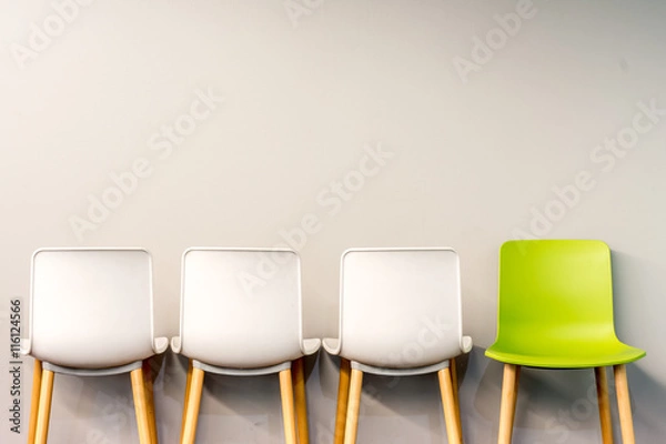 Obraz Modern chairs by the wall