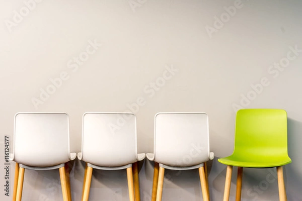 Obraz Modern chairs by the wall