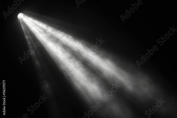 Fototapeta A single spotlight illuminates a dark space, creating dramatic beams of light and atmospheric dust motes.