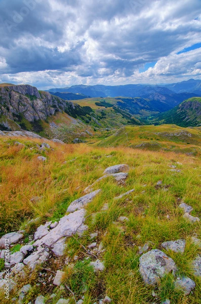 Fototapeta Montenegro, national park Durmitor, mountains and clouds panorama. Sunlight lanscape. Nature travel background