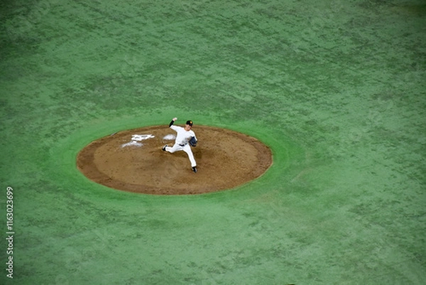 Fototapeta Baseball players in action on a mound, surrounded by green turf, showcasing the intensity and skill of the game. Famous Japanese national sport.