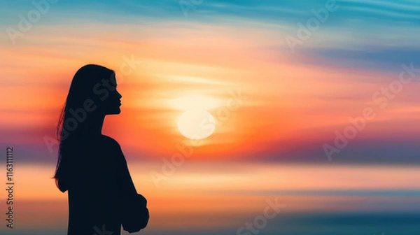 Obraz A serene silhouette of a woman gazing at the vibrant sunset on the beach, capturing a perfect moment of peace and reflection.