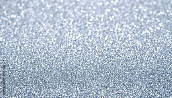 Fototapeta a close up of a silver glittered surface with a blurry background