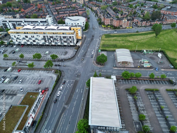 Fototapeta Aerial View of Buildings at Greater Manchester Central City, Northwest of England, United Kingdom. Aerial View Footage Was Captured with Drone's Camera on May 4th, 2024 During Sunset Time.