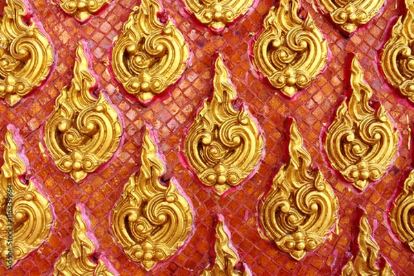 Fototapeta Thai style wall pattern in red background