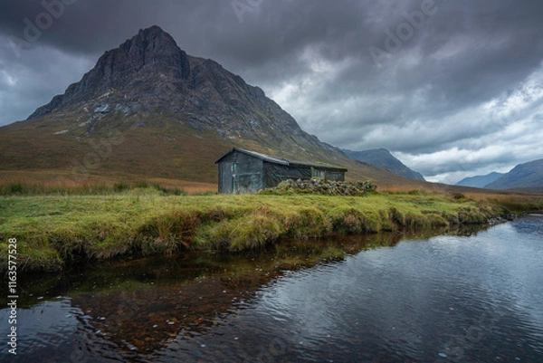 Obraz A Mountain hut, Glencoe, highlands, Scotland with dramatic mountain backdrop.