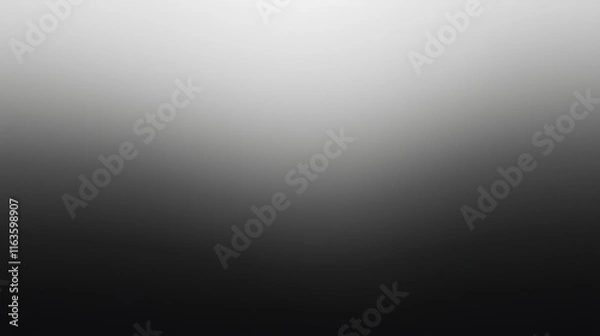 Fototapeta Neutral grey gradient background with a soft bokeh effect, ideal for a sleek and modern presentation wallpaper.

