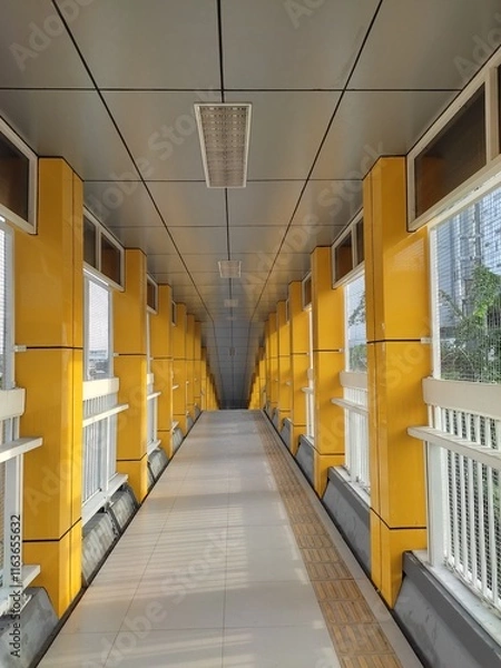 Fototapeta A pedestrian overpass above a highway