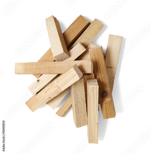Fototapeta A pile of wood fire kindling isolated on a white background