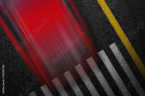 Fototapeta Level asphalted road with a dividing stripes, pedestrian crossing and moving with high speed a red car. The texture of the tarmac, top view.