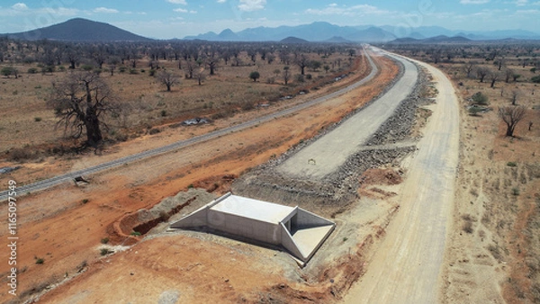 Obraz Concrete Culvert Installation Under Dirt Road Construction