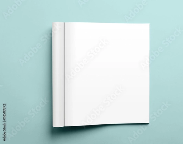 Fototapeta Blank open magazine isolated on aqua background