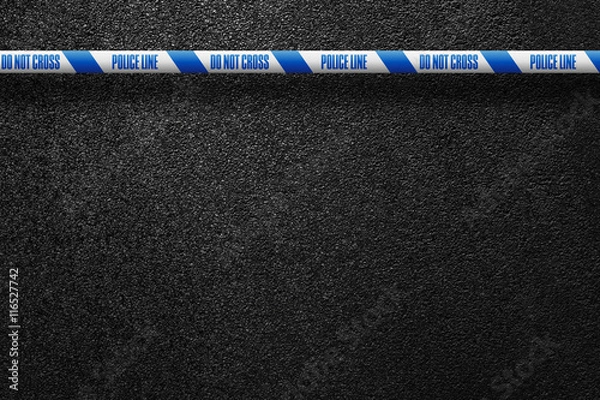 Fototapeta English white-blue police line in the background smooth asphalt road. Do not cross. The texture of the tarmac, top view.