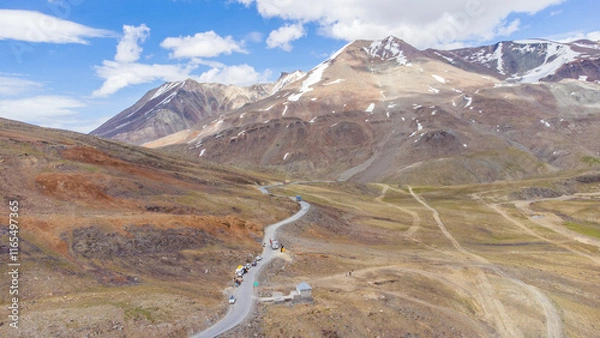 Fototapeta An aerial view of beautiful himalayan mountains in the evening at baralacha pass, leh manali highway lahul, himachal pradesh, India.