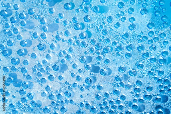 Obraz water drops on blue background