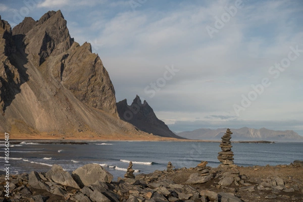 Obraz Stacked Stones and Rugged Coastline in Iceland
