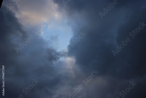 Obraz Sun Breaking through the Clouds