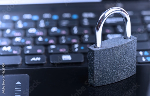 Obraz padlock on laptop computer keyboard