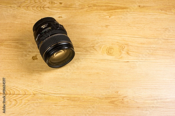 Obraz Objektiv auf Holz