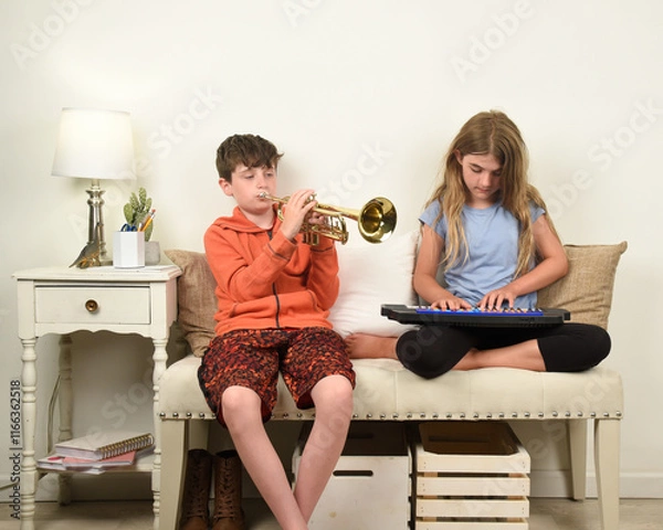 Obraz Children at Home Playing Musical Instruments Together