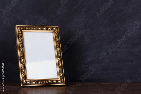 Obraz Picture frame against a dirty blackboard background