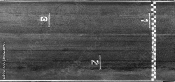 Fototapeta Aerial view race grid start, Start and finish line race track background top view, Start and finish of track racing asphalt road.