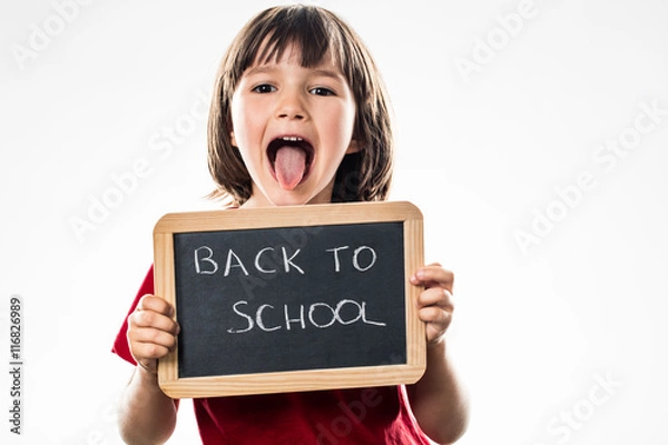 Fototapeta funny beautiful preschool kid making face for back to school