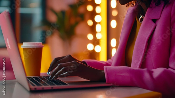 Obraz Woman in Pink Jacket Typing on Laptop Computer