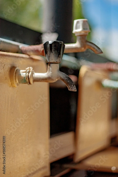 Obraz Water taps in the washbasins of a children's summer camp. Old faucets in washstands. Cranes in public washbasin for hygiene in the street.