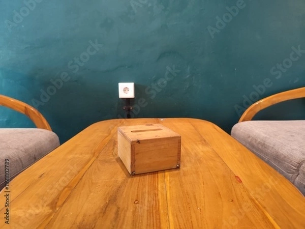 Fototapeta Wooden Table with tissue box Between Two Armchairs in a Minimalist Room