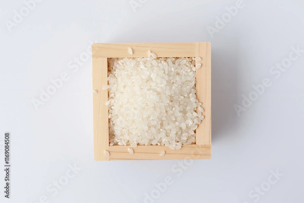 Obraz 枡に入れた お米 一合 白背景