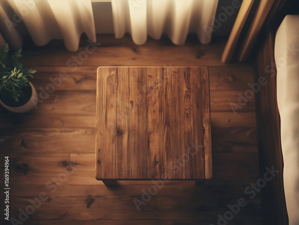Fototapeta A top-down view of a nightstand in a hotel room with a cozy, blurred background, providing an empty wooden surface for product display and customization in a flawless, generative setting