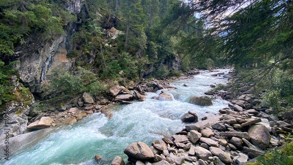 Obraz The Ache river flows down from the Krimm waterfalls.