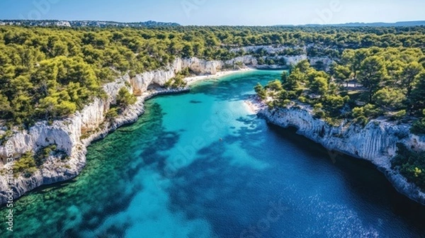 Fototapeta Aerial View of a Secluded Cove with Turquoise Waters