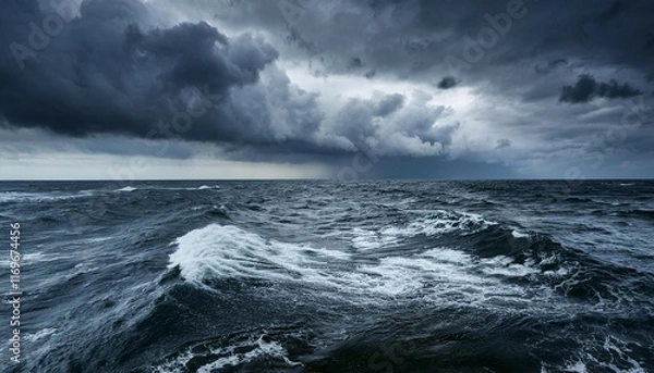 Fototapeta close up of rough seas with stormy clouds in the sky dark nature image