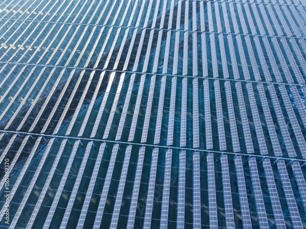 Fototapeta Drones capture large-scale photovoltaic panels on site