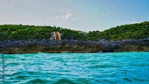 Fototapeta Remains of ancient Mayan watchtowers and look out points over the Caribbean sea near the late 13th century Mayan ruins of Tulum,Mexico